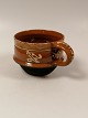 Stove pot with 
an Sjælland 
19.årh. Height 
10cm Diameter 
13cm.