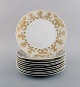 Bjørn Wiinblad 
for Rosenthal. 
10 tallerkener 
i porcelæn med 
gulddekoration. 
...