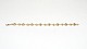 Elegant Armbånd 
med Muslinger 
14 karat Guld
Stemplet 585
Længde 20,5 cm
Tjekket af 
guldsmed ...