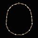 Hermann 
Siersbøl. 
Halskæde i 14k 
guld med 
perler. 
1960erne.
Tegnet og 
udført hos 
Hermann ...