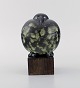 Rare figure, Lisa Larson for Gustavsberg. Black bird in glazed ceramics on 
wooden base. 1990