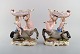 A pair of 
antique 
figurative 
Meissen 
compotes in ...