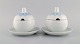 Bjørn Wiinblad 
for Rosenthal. 
To Lotus 
saucekander i 
porcelæn 
dekoreret med 
lyseblå 
lotusblade. ...