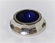 Georg Jensen. 
Sterling (925). 
Salt cellar 
with blue 
enamel. 
Diameter 5.5 
cm. Model 423.