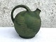 Keramik, grøn 
kande, 18cm i 
diameter, 18cm 
høj, uden 
signatur *Pæn 
brugt stand*