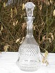 Slebet krystal 
karaffel. Højde 
25,5 cm. med 
prop 32 cm. Fin 
stand.