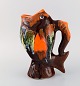 Belgisk studio keramiker. Retro kande i glaseret keramik udformet som fisk. Smuk 
glasur i brune og orange nuancer. 1960/70