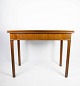 Sidebord/spillebord 
af mahogni med 
udtræk, i flot 
antik stand fra 
1890. 
H - 74 cm, B - 
90 cm ...