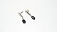 Georg Jensen 
Øreringe #17  
med sort onyx
Stemplet Georg 
Jensen  
Sterling 
Danmark
Længde 35,19 
...