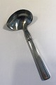 Cohr Olympia 
Silver/Steel 
Gravy Ladle 
Measures 18 
cm(7 3/32 in)