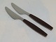 Georg Jensen 
Brun Strata, 
frokostkniv.
Designet af 
Henning Koppel 
i 1975.
Rustfrit stål 
og ...