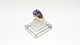 Elegant lady ring with purple stone 14 carat gold