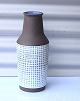 Aluminia vase 
nr. 
3241."Thule"- 
vase i brunt 
keramik, på 
midten er der 
et geometrisk 
mønster i ...