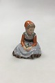Royal Copenhagen overglaze regional figurine of girl with flowers "Fyn" = "Funen" No 12420