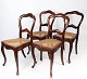 Sæt af fire rokoko spisestuestole af mahogni og med sæde af fransk rørflet fra 1860. Stolene er ...