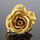 Carl Antonsen 
guldsmykke.
Rose broche 
lavet i 18 kt. 
guld, prydet 
med diamant, 
0,25 ct.
3,5 cm ...