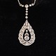 An art deco 
diamond 
necklace 
mounted in 14k 
gold and ...