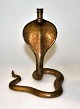 Bronze cobra med talrige dekorationer, 20. årh. Antagelig Persien. H.: 14 cm. 
