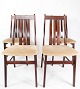 Set of four 
dining room 
chairs of 
mahogany and 
upholstered 
with light 
fabric, of 
Danish design 
...