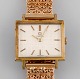 Tidligt 18 karat guld Omega herre armbåndsur. Stilrent art deco design. 1930/40'erne. 18 karat ...