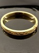 14 karat guld 
armring 6,2 x 
5,6 cm. B. 0.8 
cm. V 29 gr. 
emne nr. 466868