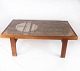 Sofabord i teak 
med klinker af 
dansk design 
fra 1960erne. 
Bordet er i 
flot brugt 
stand. 
H - 52 ...