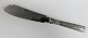 Champagne. 
Silver cutlery 
(830). Cake 
knife. Length 
26,5 cm.