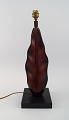 Organically shaped table lamp in hand-painted wood on base. Mid-20th century.
