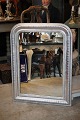 French 1800 century Louis Philippe silver fireplace mirror with finely decorated 
silver frame with pearl edge...
H:86cm. W:65cm.
