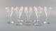 Val St. Lambert, Belgium. Eight Legagneux white wine glasses in clear 
mouth-blown crystal glass. Mid-20th century.
