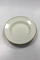 Royal 
Copenhagen 
Plain Creme 
pattern Soup 
Plate No 9590. 
Measures 22 cm 
(8 21/32 in.)