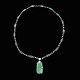 Halskæde i 14k 
hvidguld med 
Jade og 
diamanter.
Stemplet  LB, 
585.
L. 70 cm.
Vedhæng 5,8 x 
2,8 ...