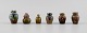 Seks belgiske 
miniature vaser 
i glaseret 
keramik. Midt 
1900-tallet.
Største måler: 
4,5 x 3,5 ...