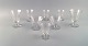 Saint-Louis, 
France. Eight 
sherry and wine 
glasses in 
clear 
mouth-blown 
crystal glass. 
...