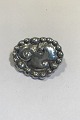 Thorvald 
Bindesbøll 
Broche fra 
Holger Kysters 
værksted 
Måler 3.3 cm x 
4 cm(1 19/64 in 
x 1 ...