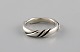 Ole Kortzau for 
Georg Jensen. 
Ring i 
sterlingsølv. 
Model 238. Sent 
1900-tallet.
Bredde: 5 ...