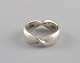 Georg Jensen 
ring i drejet 
sterlingsølv. 
Model 308. Sent 
1900-tallet.
Bredde: 6 mm.
Diameter: ...