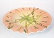 Large dinner 
plate in light 
colors of 
Italian 
porcelain. 
7.5 x 47.5 cm.
