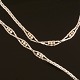 Jos. Kahn 
Købehavn, 
1957-90: 
smykkesæt 
bestående af 
armlænke og 
halskæde i 14kt 
hvidguld med 
...