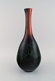 Richard 
Uhlemeyer, 
Germany. Vase 
in glazed 
ceramics. 
Beautiful 
crackled glaze 
in dark red and 
...