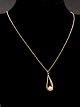 8 karat guld 
halskæde 51 cm. 
og vedhæng 2,5 
x 0,9 cm. med 
perle emne nr. 
474318