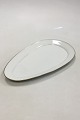 Bing & Grondahl 
White plain 
pattern with 
gold Triangular 
Dish No 16. 
Measures 32.5 
cm x 20 cm / 
...