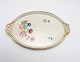 Sorgenfri, Mrk. 
Kongens Lyngby. 
Importeret i 
1952 fra 
Tyskland. 
Porcelæn i 
Creme glasur 
med ...
