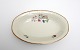 Sorgenfri, Mrk. 
Kongens Lyngby. 
Importeret i 
1952 fra 
Tyskland. 
Porcelæn i 
Creme glasur 
med ...