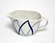 Harlekin/Blå 
flamme Dan-ild 
Lyngby. Design 
Axel Brüel i 
1958. Ildfast 
porcelæn blev 
solgt under ...