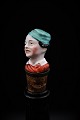 Funny, old wine 
stopper in 
painted 
porcelain with 
bust of Woman. 
Is intact and 
in good 
condition.