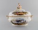 Stor antik 
Meissen 
lågterrin i 
håndmalet 
porcelæn. 
Militærscener 
og putti med 
...
