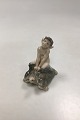 Royal 
Copenhagen 
Figur af Faun 
på Skildpadde 
No. 858.  
Designet af 
Chr. Thomsen i 
1907. Måler ...