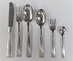 Champagne. 
Silver cutlery 
(830). Set 
consisting of 
dinner knife, 
dinner fork, 
dinner spoon, 
...