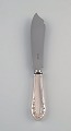 Early Georg 
Jensen Lily of 
the valley cake 
knife in silver 
(830) and 
stainless 
steel. Dated 
...